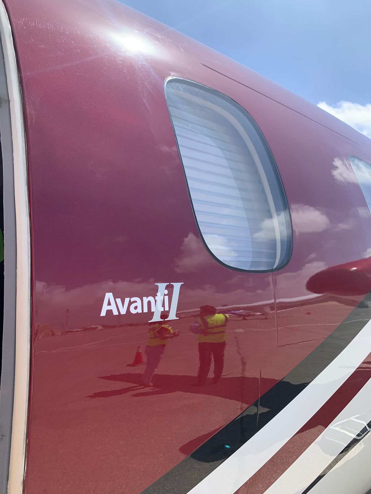 Close detail of the Piaggio P180 Avanti II fuselage